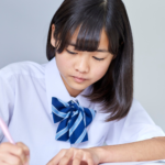 Japanese online learning classes with live virtual lessons, students studying Japanese language on laptop